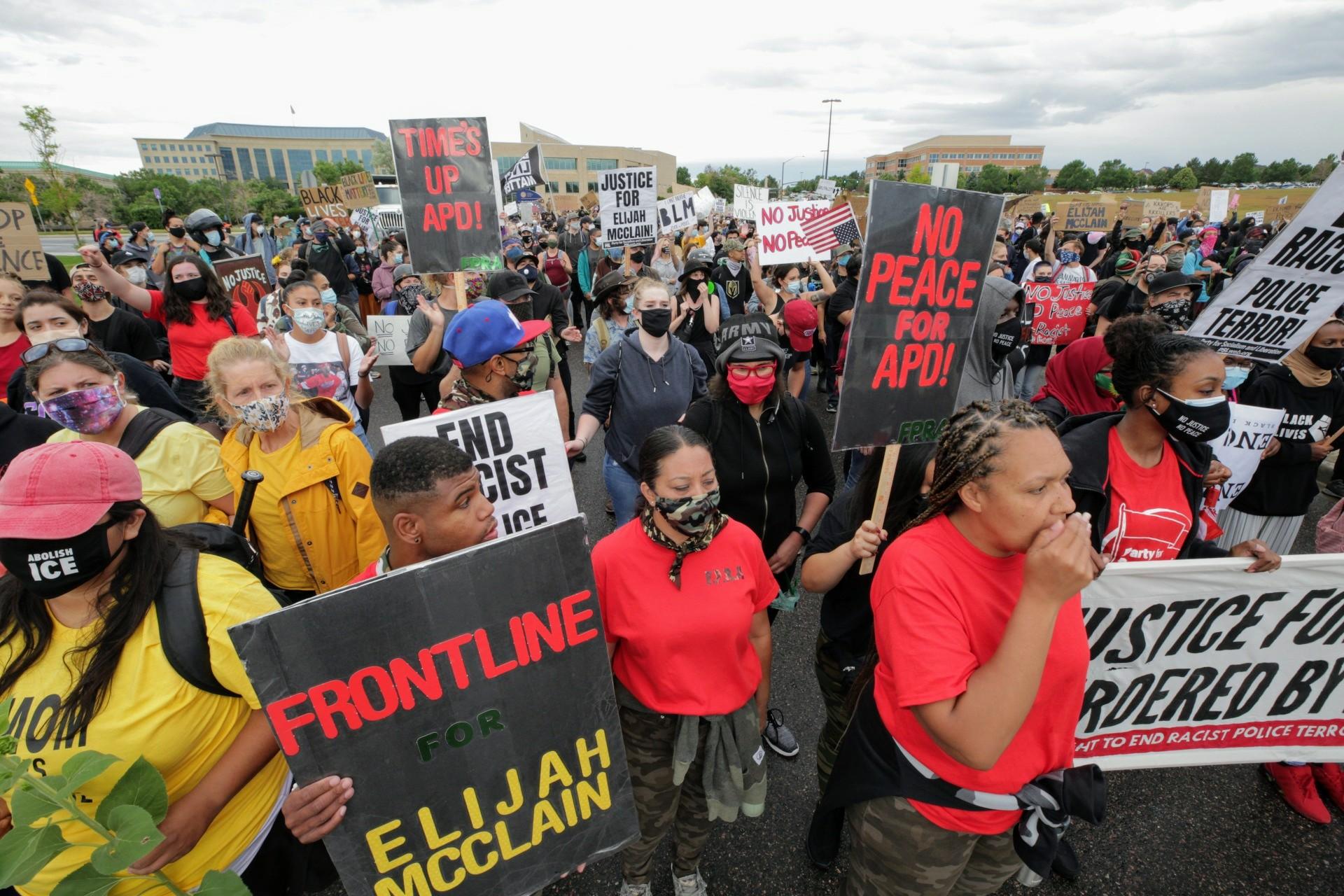 Protesters in Aurora on July 25, 2020, demand justice in the death of Elijah McClain