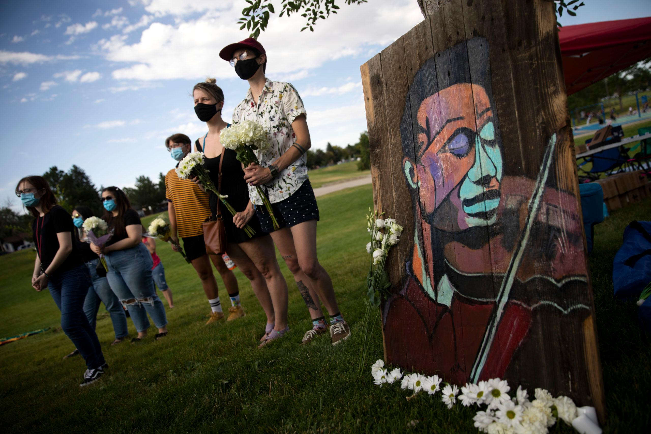 A flower and candlelight vigil for Elijah McClain in Aurora on July 11, 2020