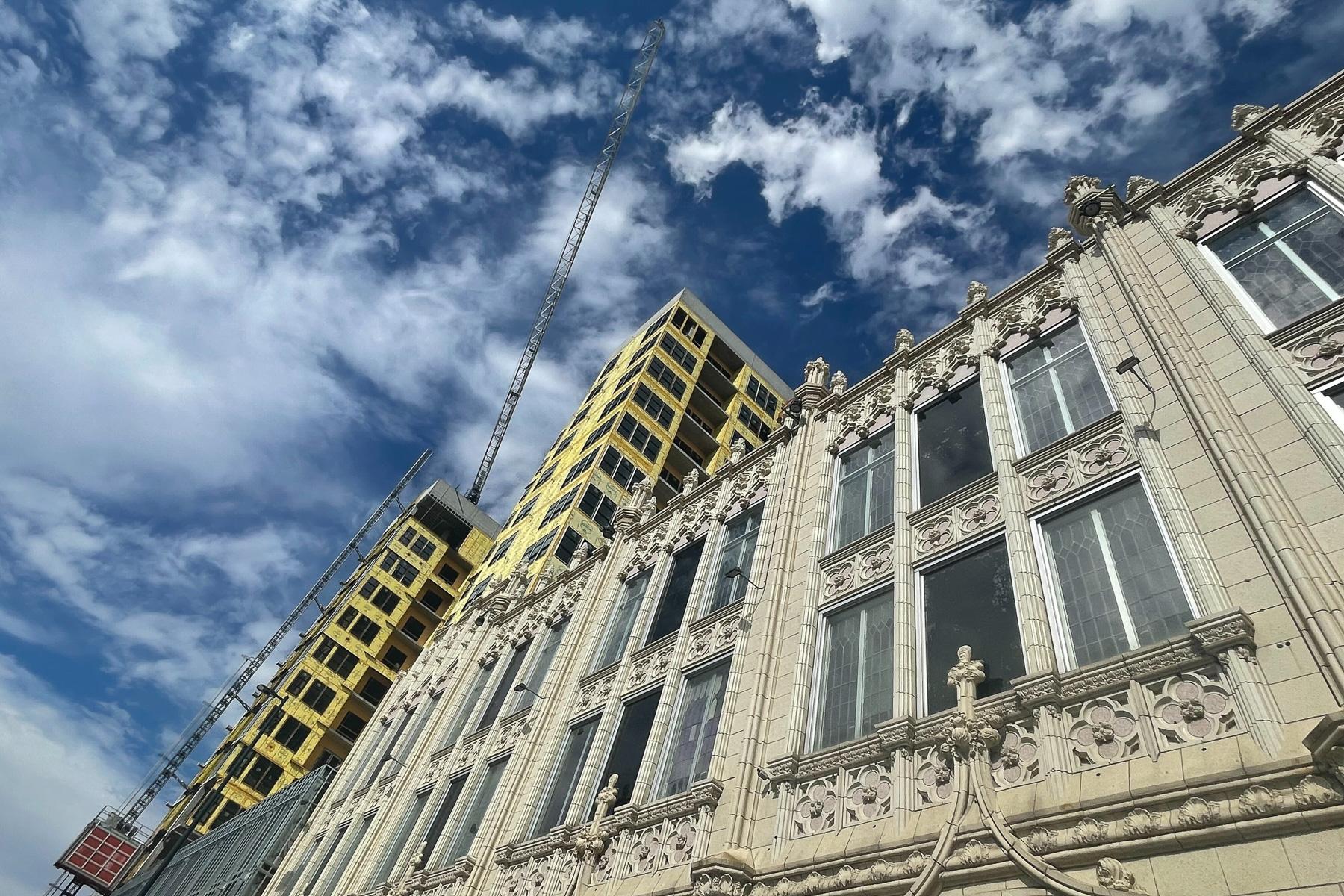 New construction and an old facade on Broadway in Denver