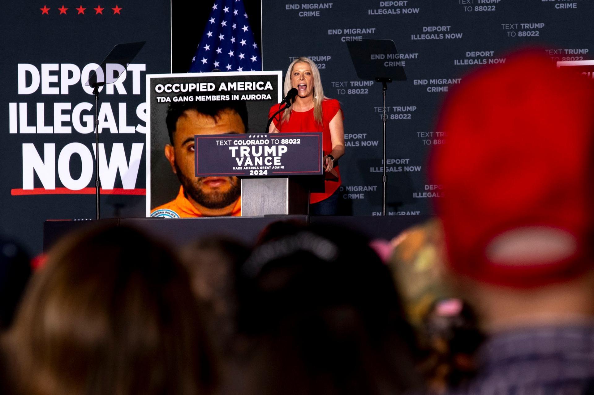 Aurora City Council member Danielle Jurinsky speaks during a rally for former President Donald Trump