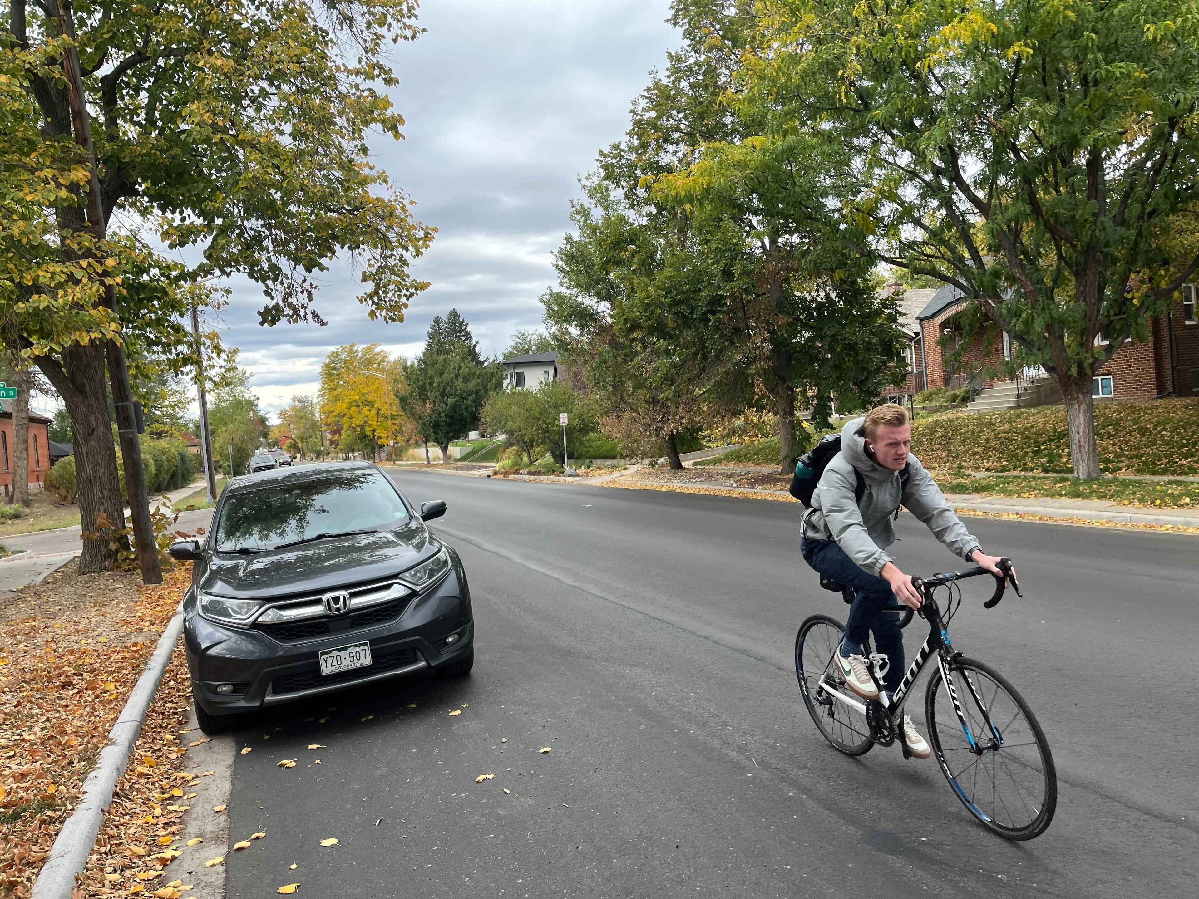 A cyclist rolls down West 29th Avenue