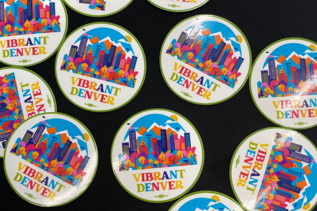 An array of colorful stickers on a black background.