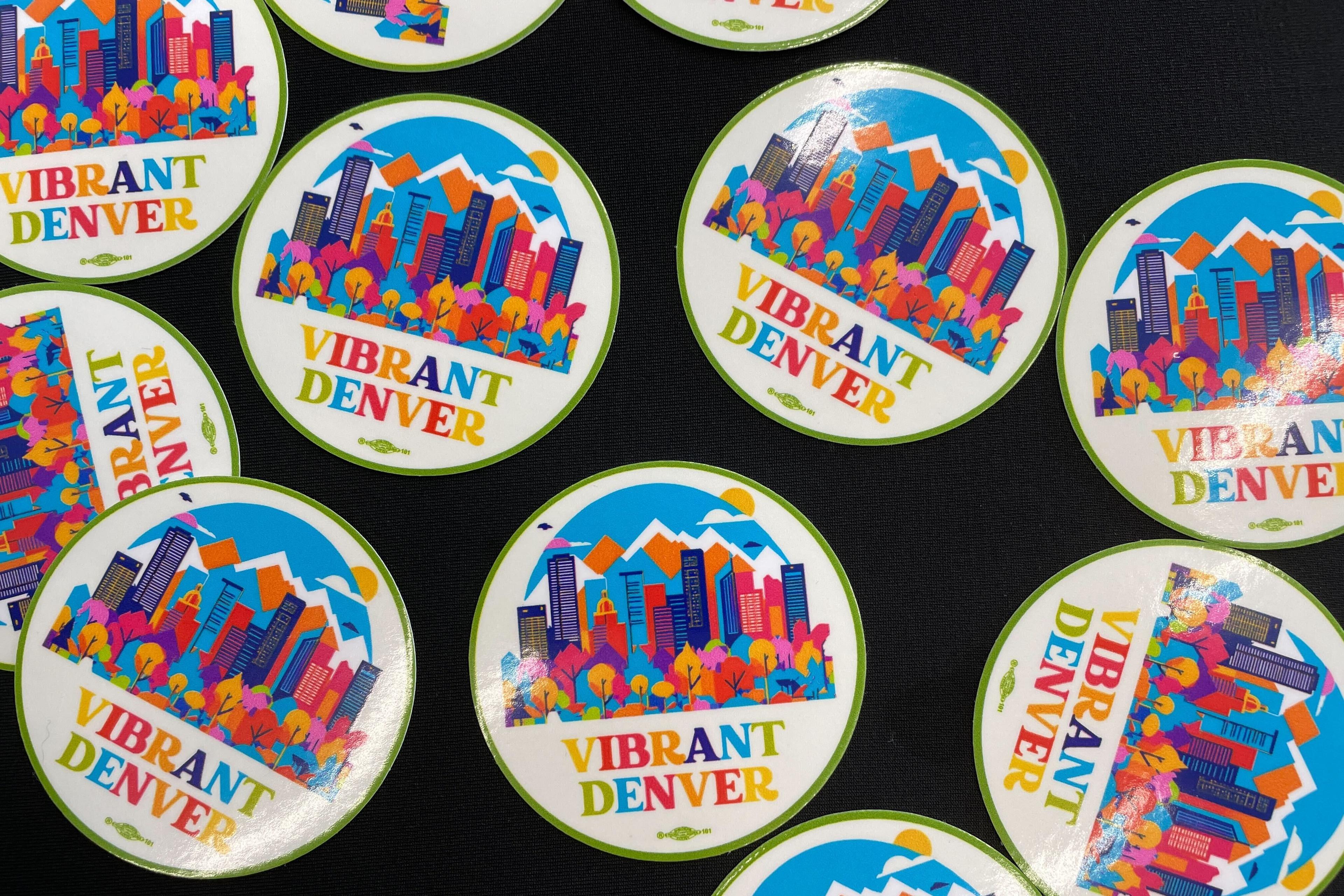 An array of colorful stickers on a black background.