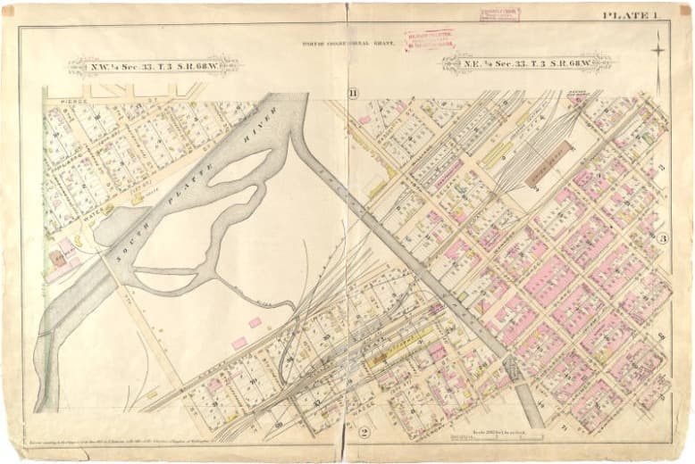 A map of Denver from the late 1800s or easrly 1900s, showing Auraria, between the South Platte River and Cherry Creek, and Denver on the northeast bank of Cherry Creek.